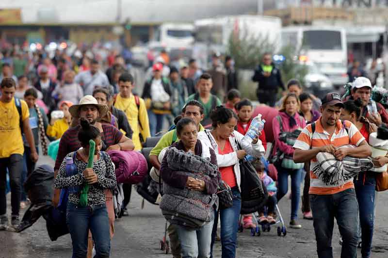 13042022migrantesmochilas00